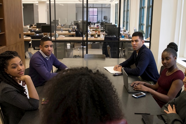 Diverse Bilama IT team collaborating on technology projects